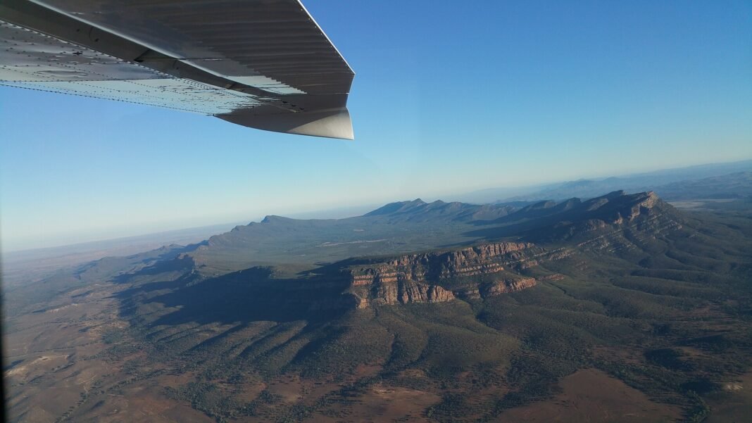 Moving to South Australia in 2026: Complete Relocation Guide Aerial view of Wilpena Pound in the Flinders Ranges, South Australia