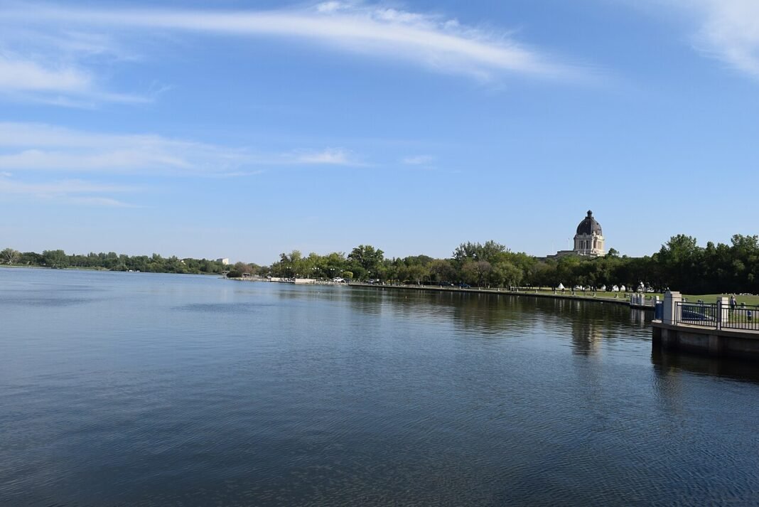 Saskatchewan Travel Guide 2026: Regina, Saskatoon, and the Prairie Horizon Saskatchewan Legislative Assembly reflected in Wascana Lake, Regina
