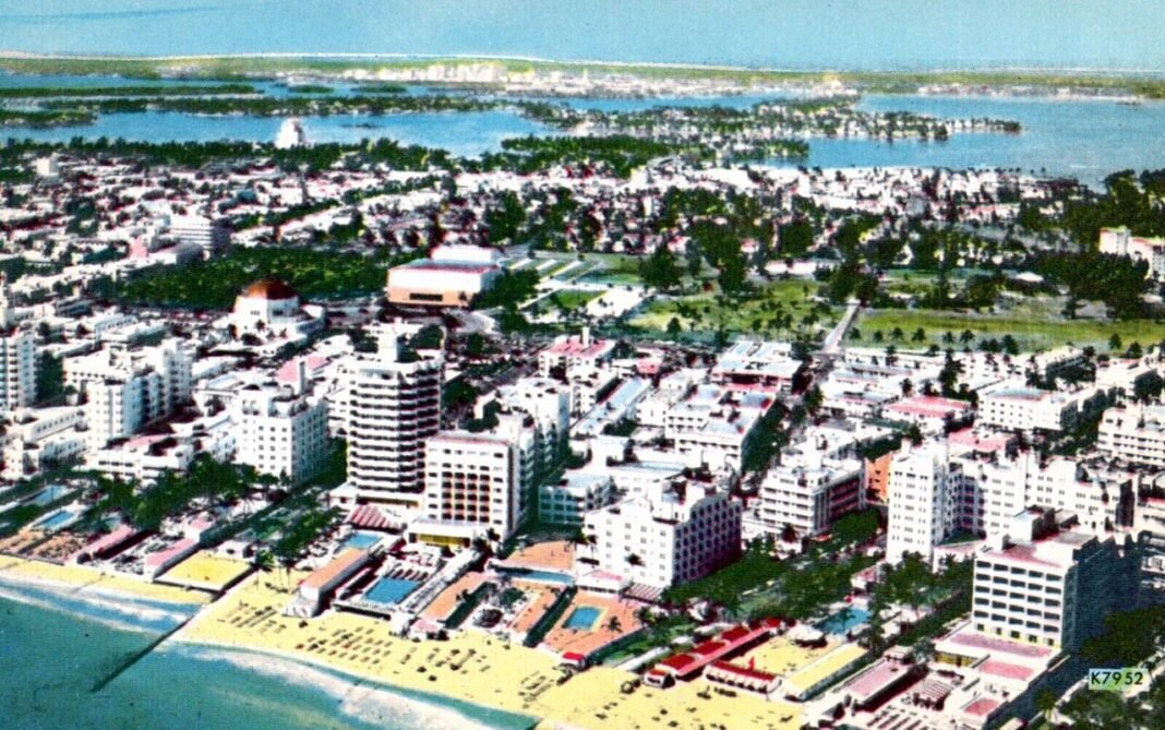 Miami Beach Travel Guide: Art Deco, Beaches, and Nightlife Aerial view of Miami Beach hotel skyscrapers and coastline, Florida