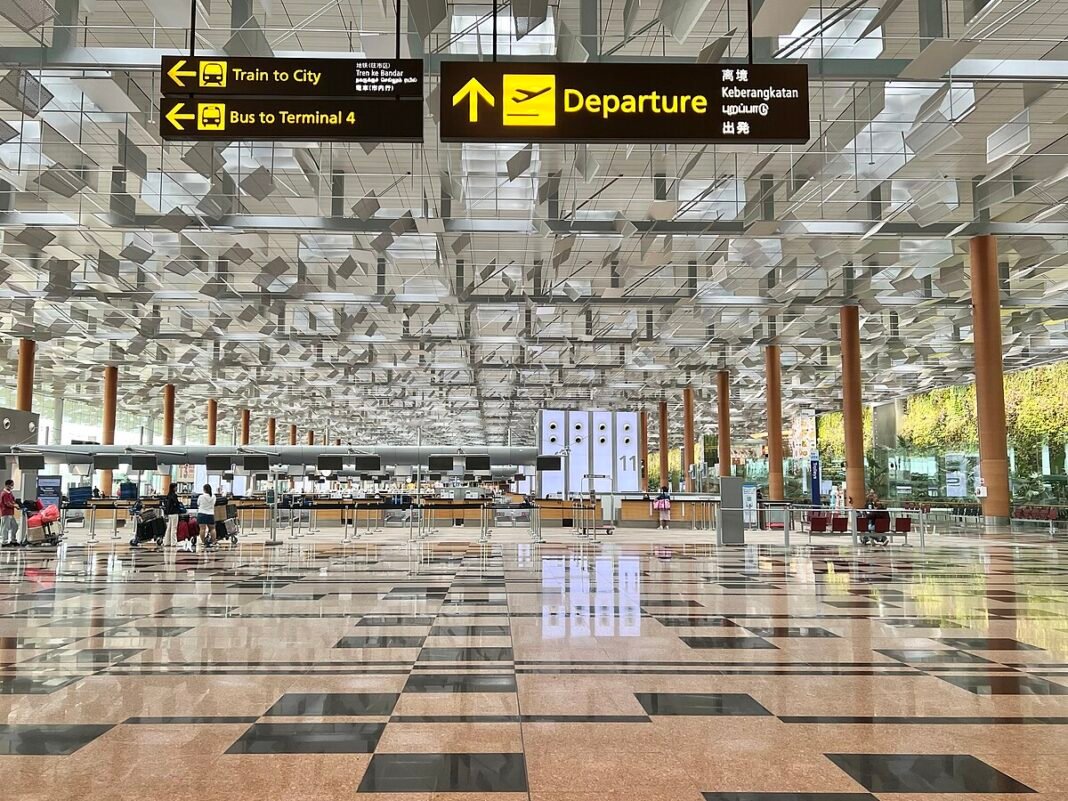 Travel Insurance Explained: What You Need and What You Can Skip Singapore Changi Airport terminal interior, February 2023