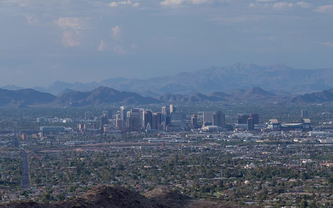 Moving to Arizona in 2026: The Complete Relocation Guide Downtown Phoenix skyline with modern high-rises, Arizona