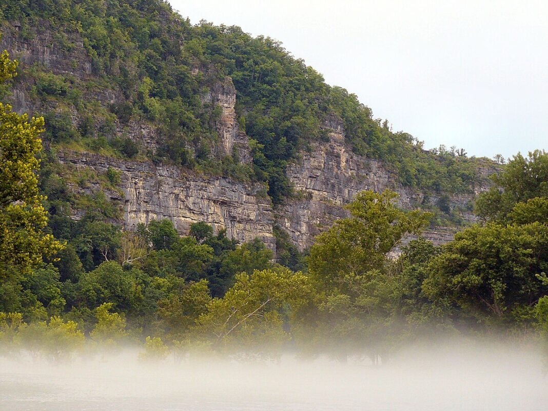Arkansas Outdoors: Hiking, Paddling, Cycling and Fishing in the Natural State Misty bluff along the Buffalo National River, Arkansas