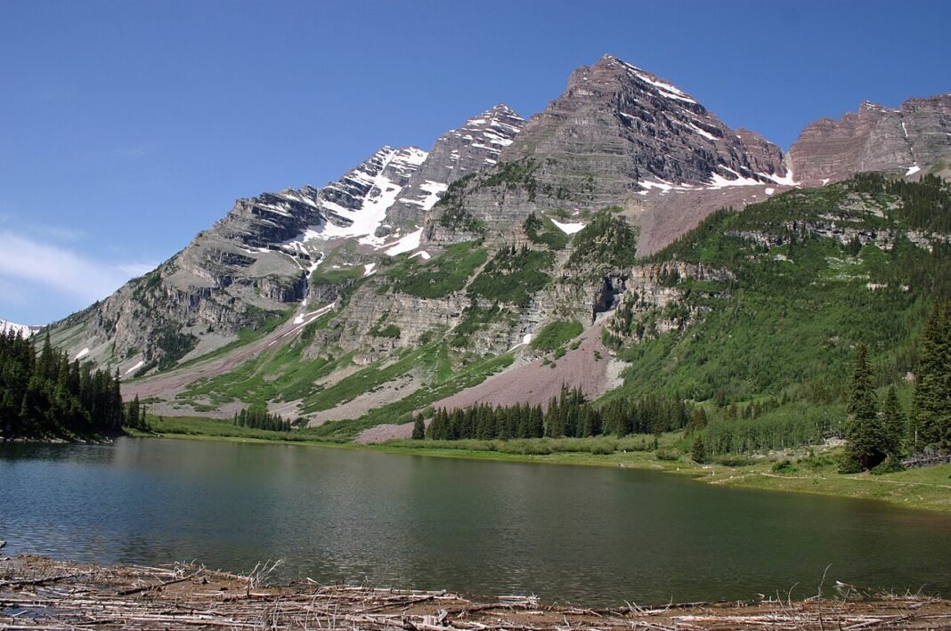 Cost of Living in Colorado 2026: The Mile High Price Tag Explained Maroon Bells twin peaks reflected in Maroon Lake, Colorado