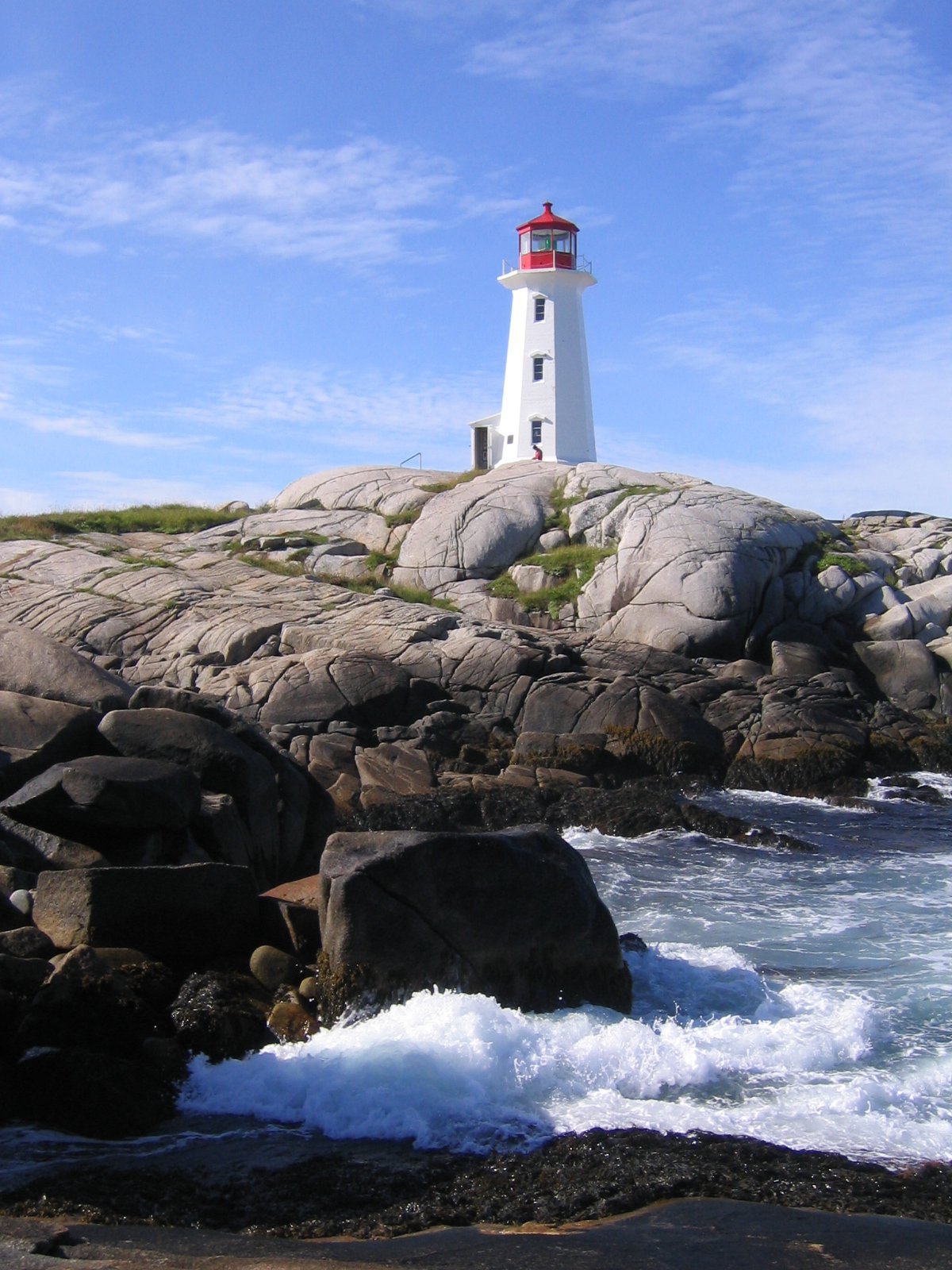 Peggys Cove Nova Scotia lighthouse rocky coastline Atlantic Ocean iconic maritime
