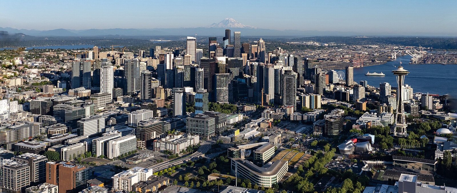 Seattle Washington State downtown aerial skyline Space Needle Mount Rainier Elliott Bay Puget Sound cityscape