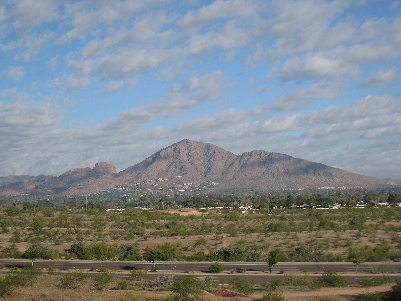 Camelback Mountain the iconic humped peak rising above the Phoenix valley desert in Arizona