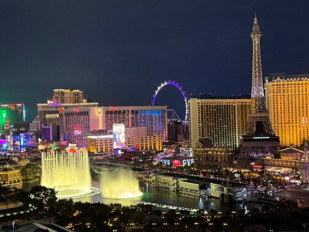 Nevada Travel Guide 2026: Las Vegas, Red Rock Canyon, and the Great Basin Las Vegas Strip at night Nevada Bellagio fountains Paris Eiffel Tower High Roller neon skyline