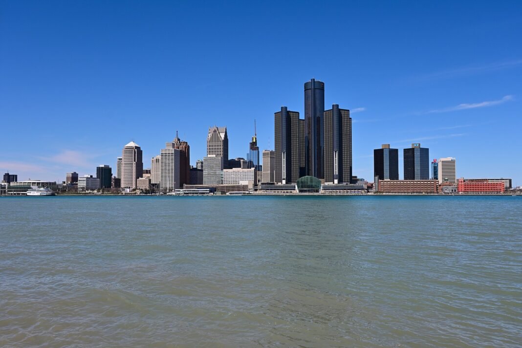 Cost of Living in Michigan 2026: Detroit’s Value and the Northern Michigan Premium Detroit Michigan skyline Renaissance Center towers across the Detroit River