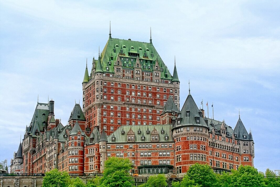 Quebec Travel Guide 2026: Montreal, Quebec City, and the Laurentians Chateau Frontenac grand hotel with green copper roofs and turrets above the old town of Quebec City, Quebec, Canada