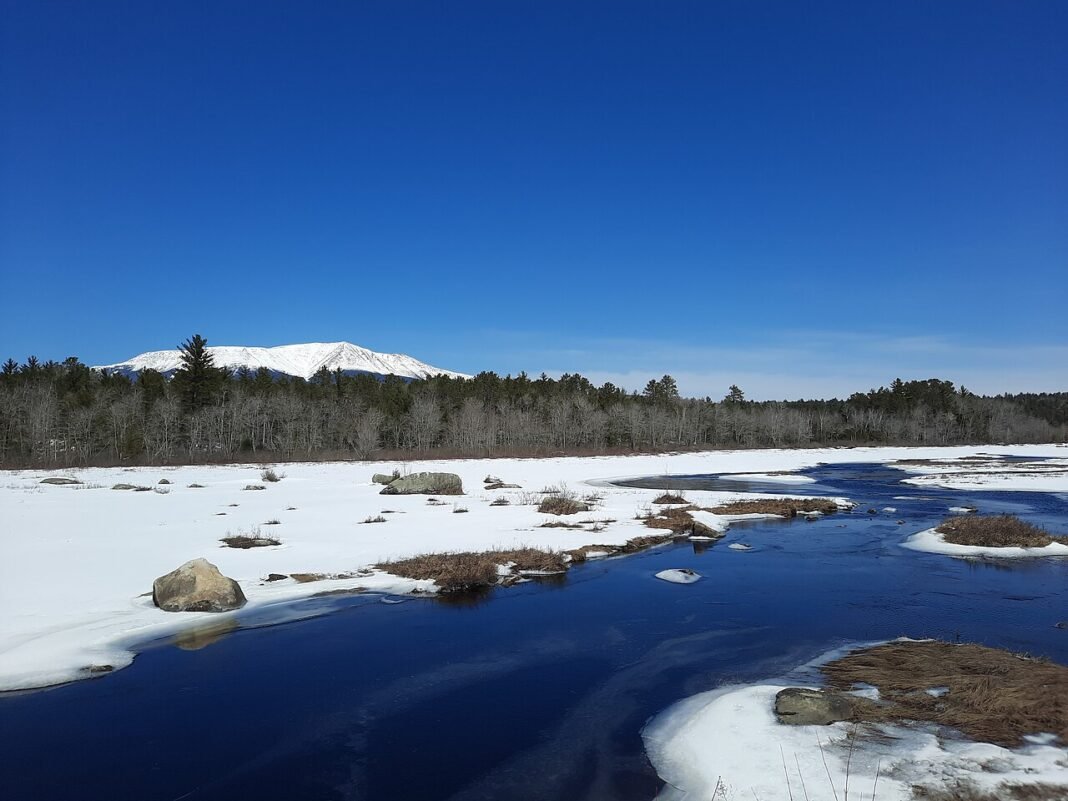 Maine Outdoor Activities 2026: Wilderness, Coastline, and Appalachian Summit Snow-capped Mount Katahdin rising above the North Maine Woods in Baxter State Park, northern terminus of the Appalachian Trail
